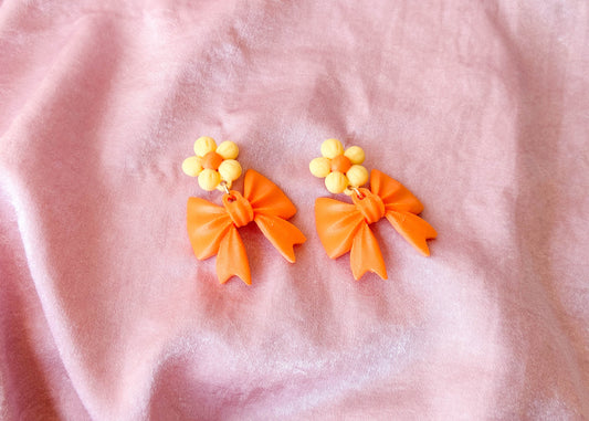 The Dahlia Orange Bow Earrings